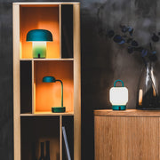 Compact Fokus lamp with USB charging dock, offering dimmable lighting and 40-hour battery life for any space.