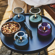 Glow 08 candle holder by Kooduu: modern brushed aluminum and glass design, offering 100+ hours of safe LED candlelight.