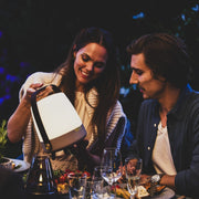 Lite-up Play Mini by Kooduu: portable speaker lamp with JBL audio, adjustable warm light, and sleek brass accents.