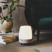 Lite-up Play wireless speaker and lamp: portable design with warm LED light and Bluetooth pairing for immersive sound.