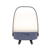 Kooduu Lite-up Play Mini in Ocean Blue: compact Bluetooth speaker lamp with JBL sound, warm LED light, and elegant wooden handle.