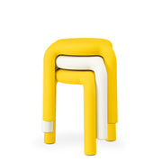 Piccolo stool in polypropylene, designed by Florent Coirier, offers stylish comfort with lightweight, stackable functionality.