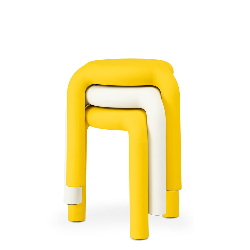 Piccolo stool in polypropylene, designed by Florent Coirier, offers stylish comfort with lightweight, stackable functionality.