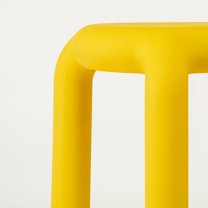 Versatile Piccolo stool and side table, featuring a playful yet substantial design for modern indoor and outdoor environments.