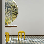 Lightweight Piccolo stool, perfect for indoor and outdoor use, offering both style and practicality.