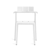 Stylish and stackable Yard armchair by TOOU Design, ideal for cafe corners or urban terraces with sleek modern charm.