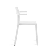 Elegant Yard armchair by TOOU Design in white, offering ergonomic comfort and versatile seating for indoor and outdoor use.