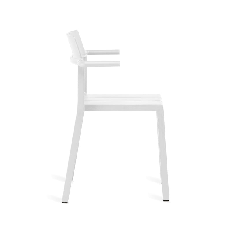 Elegant Yard armchair by TOOU Design in white, offering ergonomic comfort and versatile seating for indoor and outdoor use.