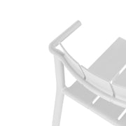 Close-up of the Yard armchair’s refined proportions, offering comfort and elegance with durable polypropylene construction.