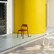 Durable and stackable Yard chair by TOOU Design, made from polypropylene for both indoor and outdoor use.