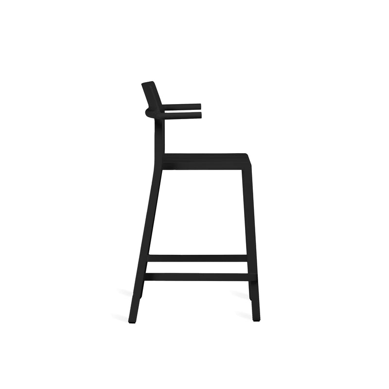 Yard counter stool with arms by TOOU Design in black, blending retro-inspired aesthetics with contemporary comfort and functionality.