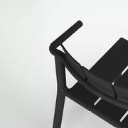 Yard counter stool with arms by TOOU Design, showcasing sleek lines and armrests for added comfort in any environment.