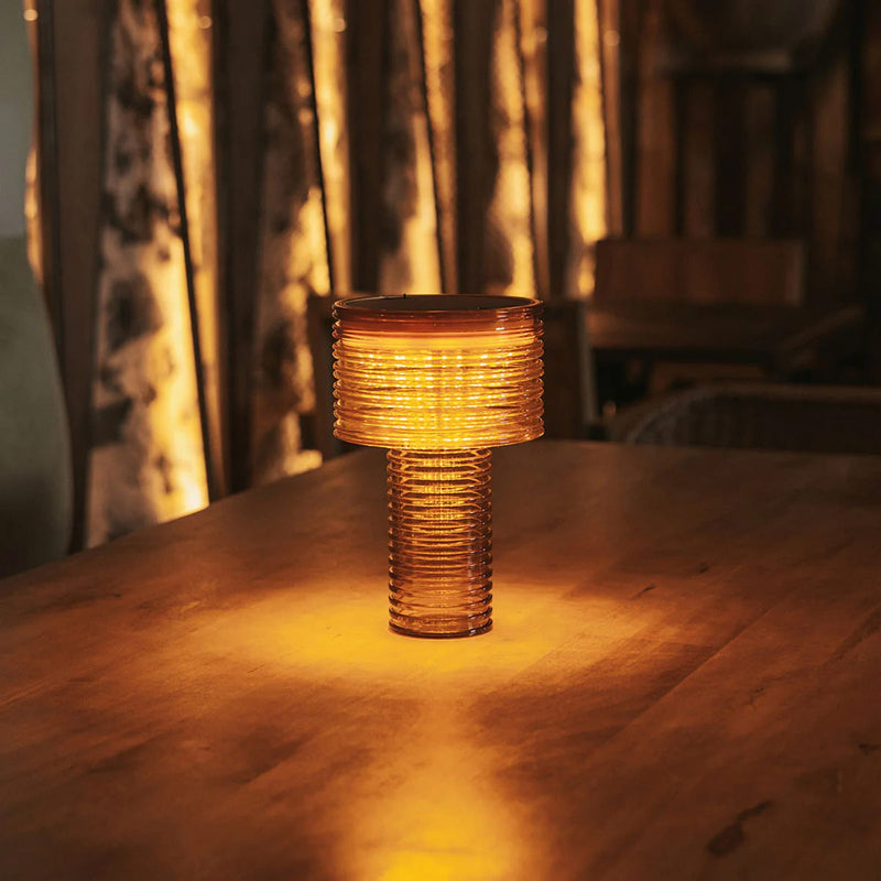Designed for modern spaces, Ambar delivers soft ambient light with solar charging and long-lasting battery autonomy.