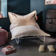 Beanbase turns your Fatboy bean bag into a comfortable lounge chair.