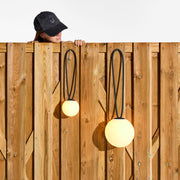 A small yet charming lamp designed for indoor and outdoor use.