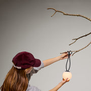 Portable mini lamp with three dimming levels and up to 24 hours of light.