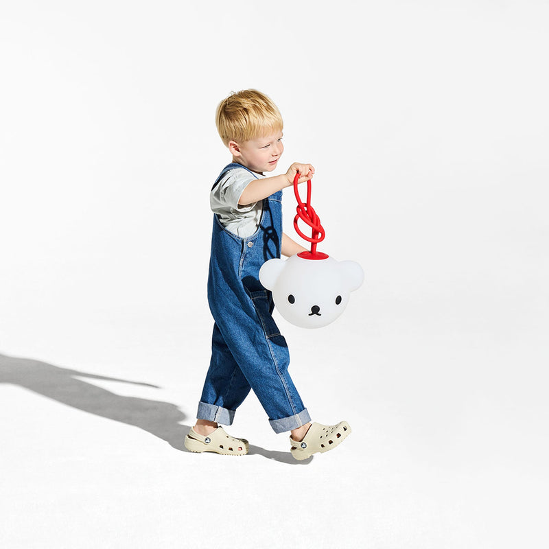 A portable LED lamp with a friendly design and soft 2700K glow.