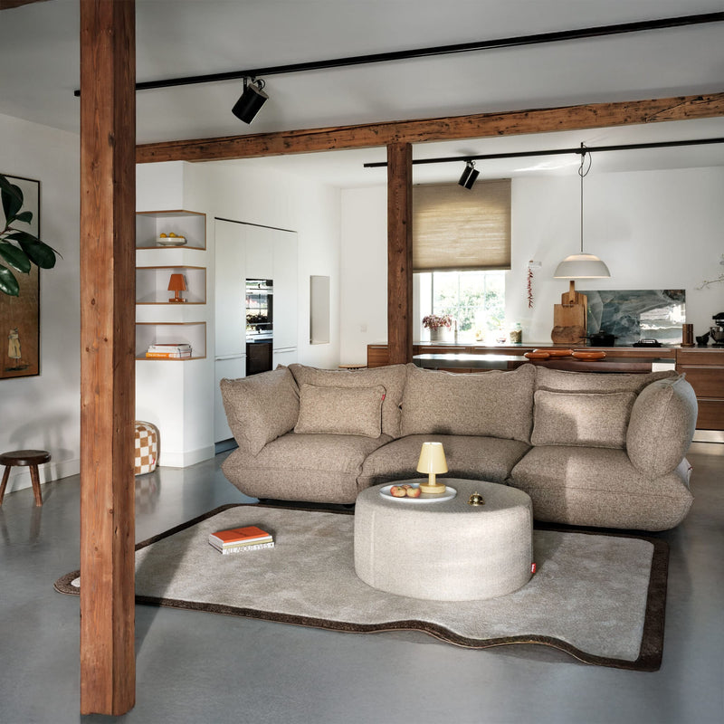 A large designer rug with playful curves and calm presence.