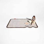 Carpet Petit Not Straight adds soft curves and character to small spaces.