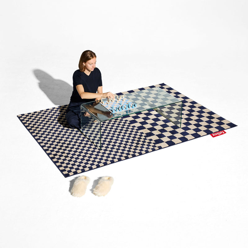 A graphic designer rug with a calm, balanced colour palette.