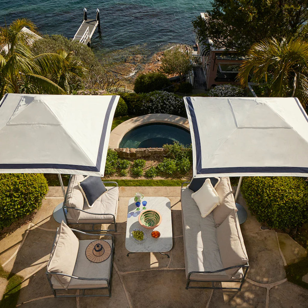 Durable and elegant Regatta Patio Umbrella by Basil Bangs, built with marine-grade stainless steel and replaceable parts for long-term use.