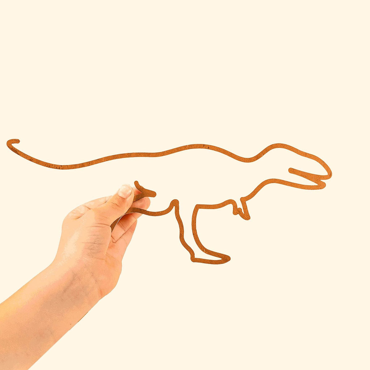 The Dinosaur Line: Fun metal silhouette featuring a playful dinosaur, perfect for sparking imagination in kids&#39; spaces.