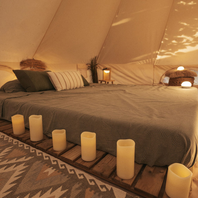 A trio of compact LED candles for elegant decor, powered by replaceable AAA batteries.