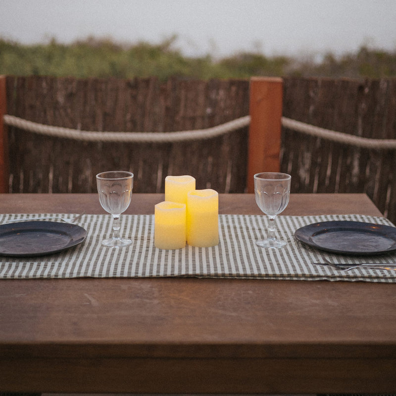 Indoor-outdoor ready (IP44) LED candles in a set of three, made for calm, layered atmosphere.