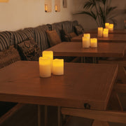 A stylish set of three LED candles, perfect for tables, shelves, and outdoor settings with protection.