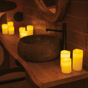 Three candle-style lamps in varying heights, designed to create soft, elegant atmosphere anywhere.