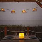 Compact candle-style lamp designed for refined, intimate lighting moments.