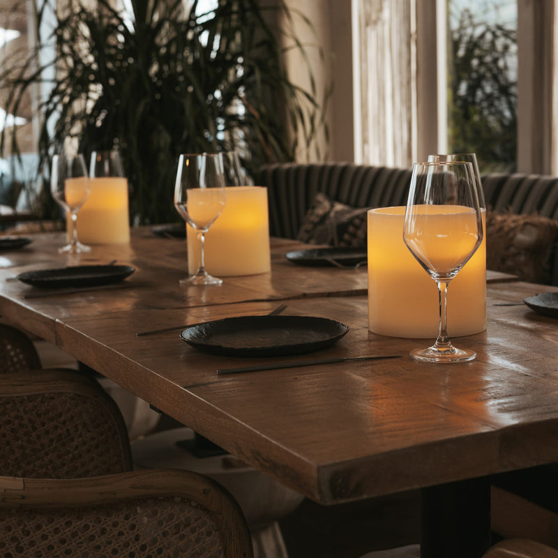 Three LED wicks recreate candlelight movement with warm, intimate illumination.