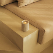 A refined alternative to traditional candles, blending ceramic design and LED technology.