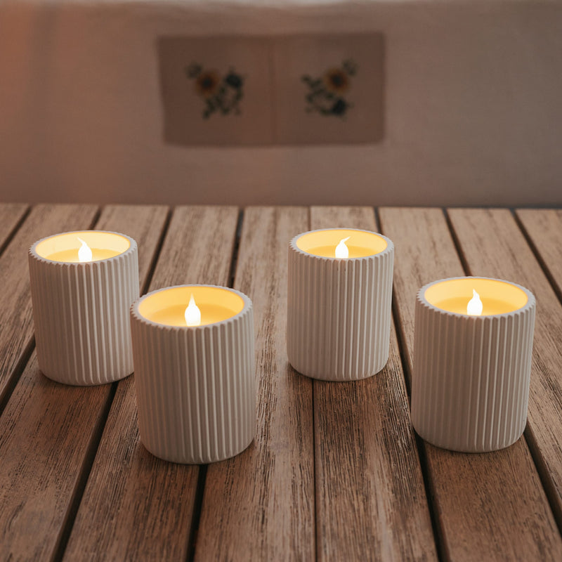 Designed for subtle atmosphere, Dolo Ceramic delivers soft candle-effect light without a flame.