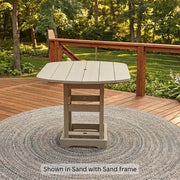 Krahn Dining Table in Sand colour on a deck