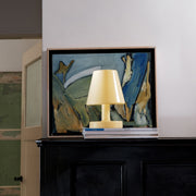 A compact rechargeable lamp with warm 2700K glow and smooth dimming.