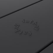 Close-up of Fred’s table by Fatboy in anthracite, showcasing its durable aluminum slats for a sleek and weather-resistant finish.