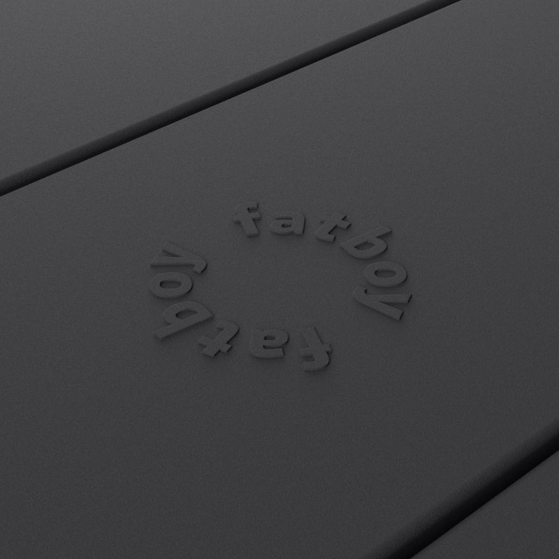 Close-up of Fred’s table by Fatboy in anthracite, showcasing its durable aluminum slats for a sleek and weather-resistant finish.