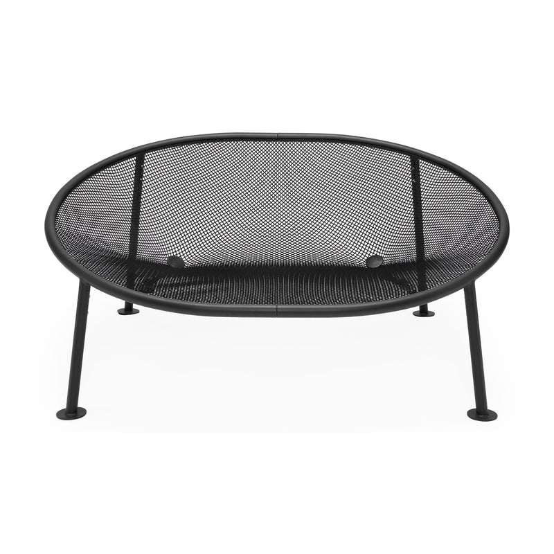Durable and weather-resistant Netorious daybed by Fatboy, featuring playful legs and a sleek design for all-day comfort outdoors.