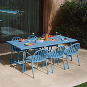 Comfortable armrests and curved seat of Fred’s Armchair, designed for long-lasting outdoor relaxation.
