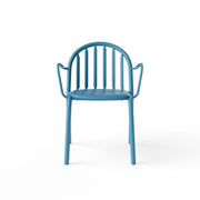 Stackable Fred’s Armchairs displayed on a garden deck, emphasizing their lightweight and easy-to-store design.