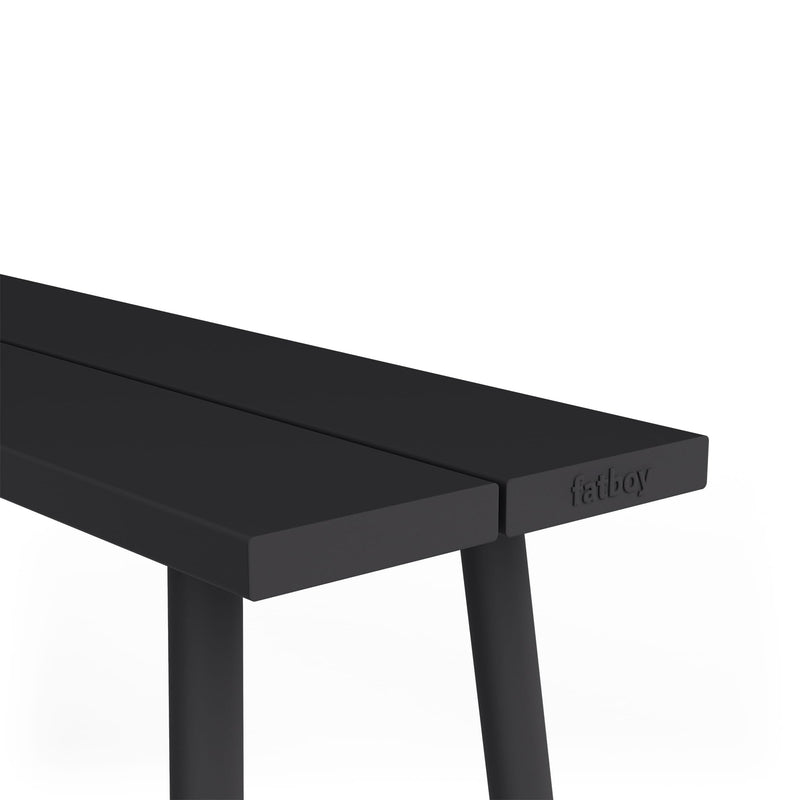 A contemporary bench inspired by the classic picnic shape.