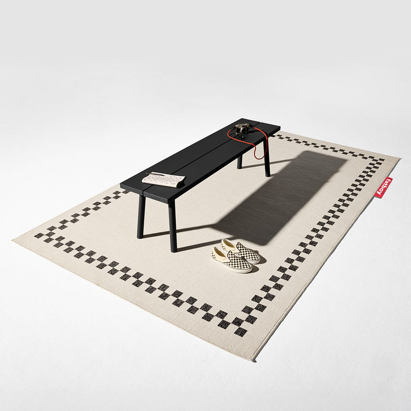 A durable aluminum bench suitable for home and professional use.