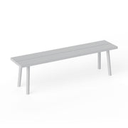 Fred’s Bench in light grey is a modern aluminum bench designed for relaxed outdoor seating.
