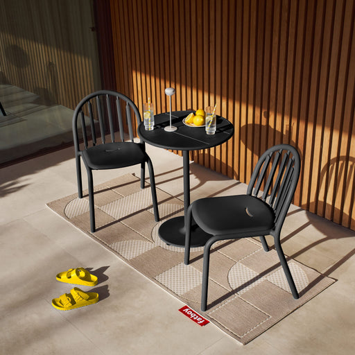 Lightweight Fred's Bistro Set designed with weather-resistant materials for stylish and functional outdoor dining.
