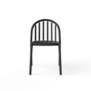 Stylish Fred’s Chair enhancing the charm of a contemporary outdoor patio space.