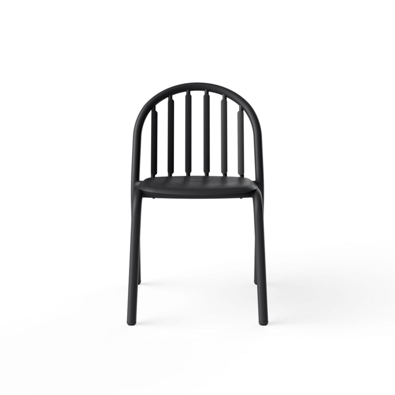 Stylish Fred’s Chair enhancing the charm of a contemporary outdoor patio space.