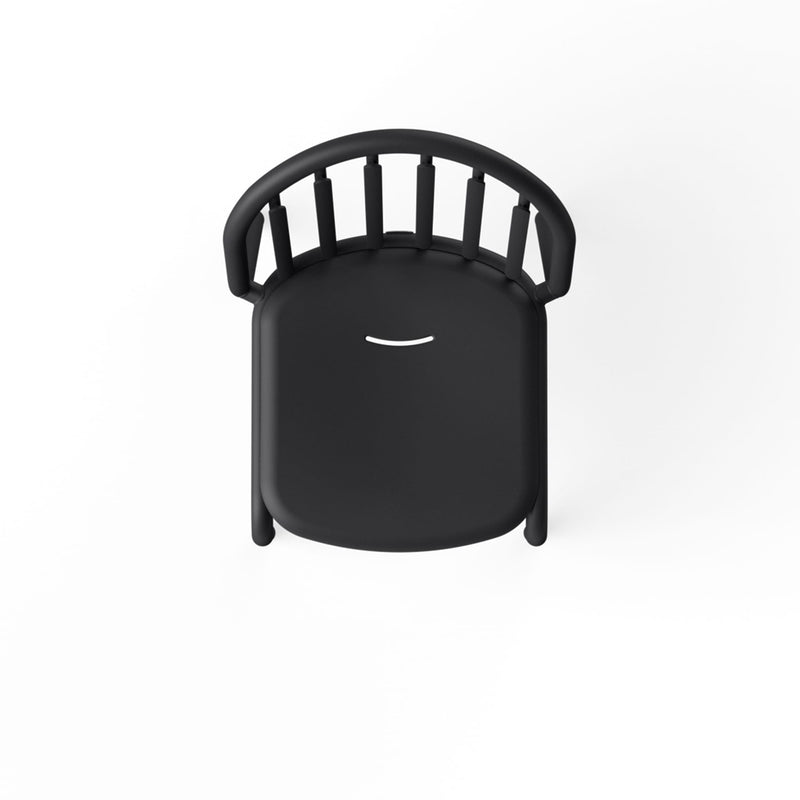 Close-up of Fred’s Chair seat with a smile-shaped opening for water drainage, ideal for rainy outdoor use.