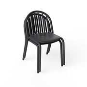 Stackable Fred’s Chairs displayed in a compact space, highlighting their lightweight and space-saving design.