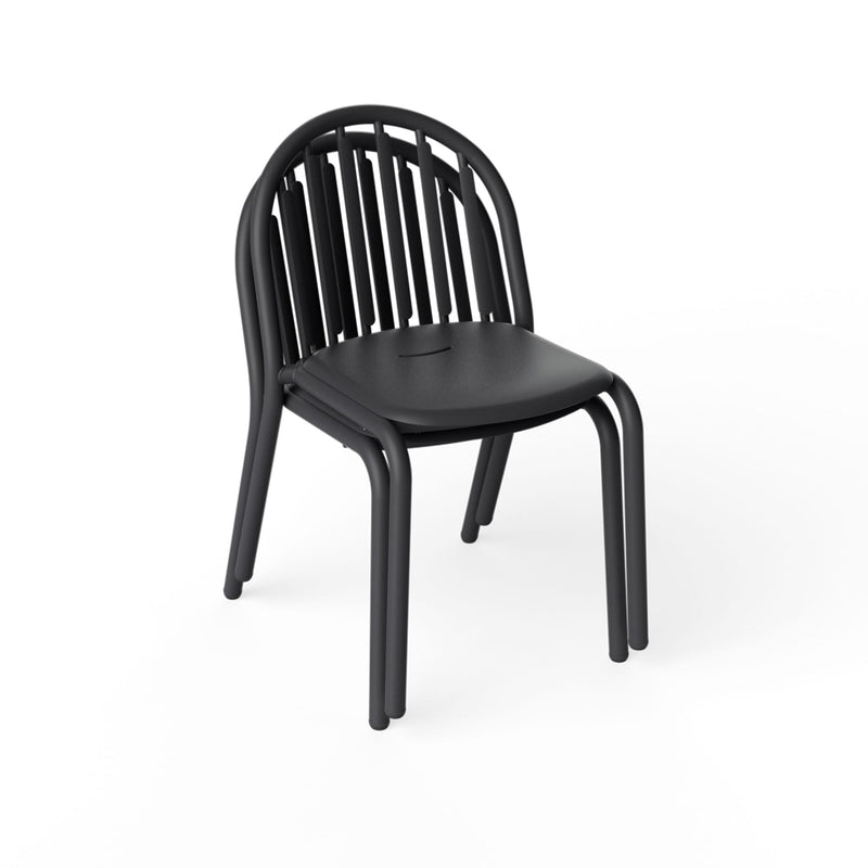 Stackable Fred’s Chairs displayed in a compact space, highlighting their lightweight and space-saving design.